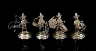 Set of four Chinese Sterling silver figures of orientals at various pastimes, one with net another c