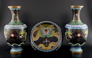 Pair of Chinese cloisonn‚ black ground vases decorated with yellow dragons chasing the flaming pearl