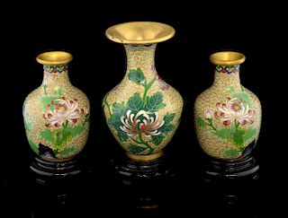 Pair of modern Chinese cloisonne vases, the light coloured ground decorated with flowers and foliage