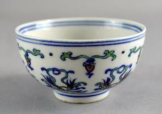 Chinese small porcelain bowl with floral decoration, six character mark to base, 9cm diameter