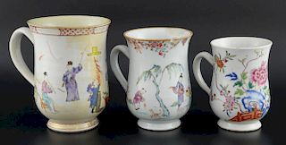 Three 19th century Chinese mugs, two decorated with figures at various pursuits, the other with flow