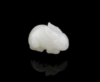 Chinese carved white nephrite jade figure of a rabbit, 4.3cm long,