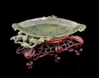 19th century Chinese spinach jade shallow brush washer of oval form and carved with three dragons, o