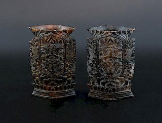 Pair of Chinese black/brown soapstone vases with pierced and carved decoration of dragons, flowers a