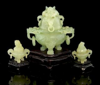 Modern Chinese green hardstone tripod censer and cover with mask ring handles on shaped supports and
