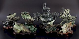 Six modern Chinese green/brown/white hardstone animal groups to include elephant, tiger and water bu