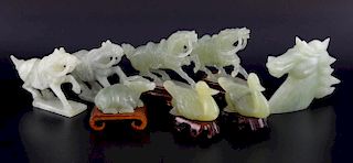 Four modern Chinese carved green hardstone horses, horses head, two ducks, water buffalo, some on wo