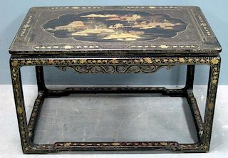Chinese black lacquered and gilt table decorated with landscape scenes and geometric patterns, 41cm
