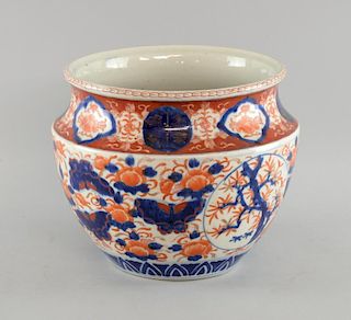 Japanese Imari palette jardiniere decorated with panels of flowers and foliage, 24cm high,