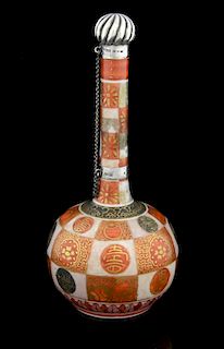 19th century Japanese Kutani bottle vase with panels of repeating decoration, marks to base, with an