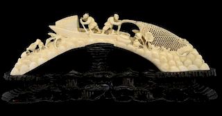 19th century Japanese ivory carved tusk in the form of fishermen on a boat at sea, on carved hardwoo