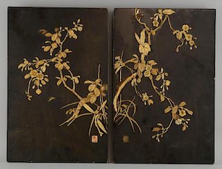 Pair of Japanese black lacquered panels with overlaid bone and mother of pearl floral and foliate de