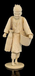 Japanese carved ivory and bone sectional figure of a man carrying a woven basket, signed to undersid