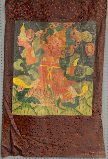 Tibetan Thangka painting depicting a figure riding on the back of a tiger, 98cm x 62cm,