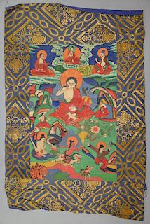 Tibetan Thangka painting with a central goddess like figure and other figures around it, 73cm x 49cm