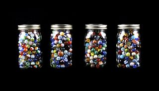 Four Mason Jars of Assorted Marbles Collection