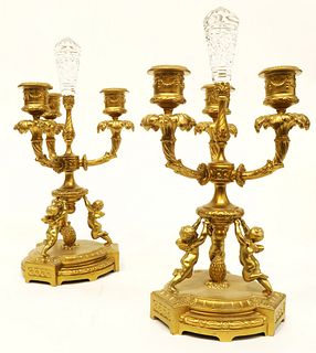 A Pair of bronze & Crystal Figural Candelabra
