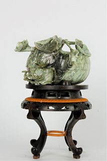 A Chinese Natural Dushan Jade Carved on the Wood Base