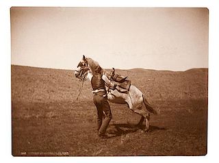 L.A. Huffman, Photograph of Cowboy in Action 
