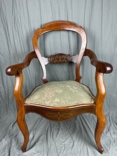 A Vintage Wood Arm Chair