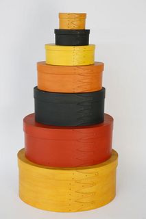 Stack of 7 Colorful Shaker Oval Pantry Boxes