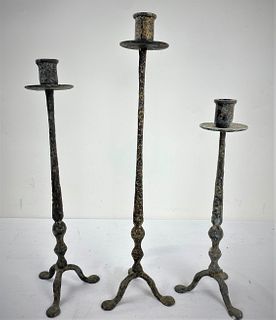 Three Bronze Candle Holders
