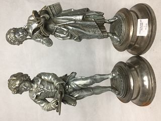 A PAIR OF 19TH CENTURY METAL STRIDING FIGURES, A YOUNG SCRIBE, ON CIRCULAR BASES. 33CM HIGH.