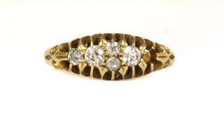 An Edwardian 18ct gold diamond set boat shaped ring,