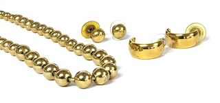 A pair of Christian Dior gilt metal hoop earrings,