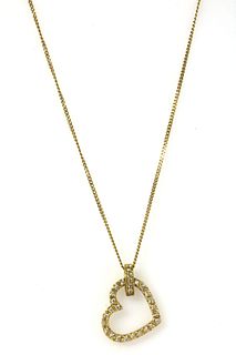 An 18ct gold diamond heart pendant,