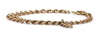 A length of 9ct gold graduated curb chain,