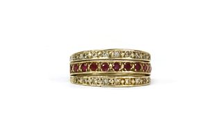 A 9ct gold ruby and sapphire 'night and day' eternity ring,
