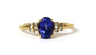 An 18ct gold tanzanite and diamond ring,