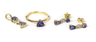 A gold tanzanite matched suite,