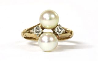 A gold cultured pearl and diamond ring,