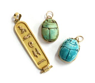 An Egyptian gold cartouche pendant,