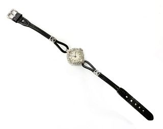 A ladies' 18ct white gold diamond set Vertex mechanical strap watch, c.1930,