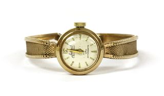 A ladies' 9ct gold Accurist mechanical bracelet watch,