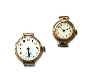 Two gold mechanical watch heads,