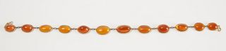 Bracelet/Necklace with Orange Glass (?) Cabachons