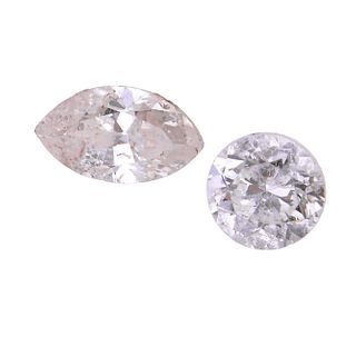 Dos diamantes corte brillante y marquís distintas calidades 0.62 ct.