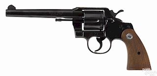 Colt Official Police revolver, .38 special caliber, with walnut Colt grip, 6'' round barrel
