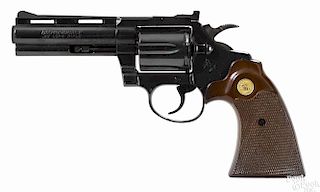 Colt Diamondback revolver, .22 caliber, blued with walnut grips, 4'' round barrel, serial #D93202.