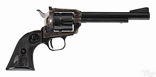 Colt New Frontier single-action Army revolver, .22 long rifle caliber, with black plastic grips