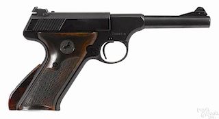 Colt Woodsman Sport semi-automatic pistol, .22 long rifle caliber, with brown plastic grips