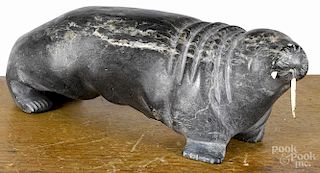 Two Inuit carved soapstone animals, 20th c., to include a walrus, 9'' l., and a seal, initialed EA