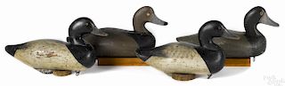 Four R. Madison Mitchell carved and painted duck decoys, mid 20th c., two signed