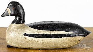 Attributed to Doug Jester, carved and painted goldeneye duck decoy, mid 20th c., 13 1/2'' l.
