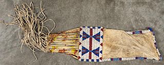 Plains Native American beaded hide tobacco bag, ca. 1900, 24'' h.