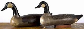 Two carved and painted Canada goose decoys, mid 20th c., 24'' l. and 22'' l.